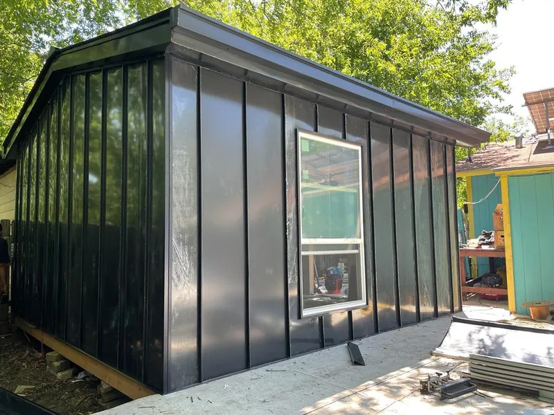 Black standing seam metal wall panels for Roof Inspection in Suffern