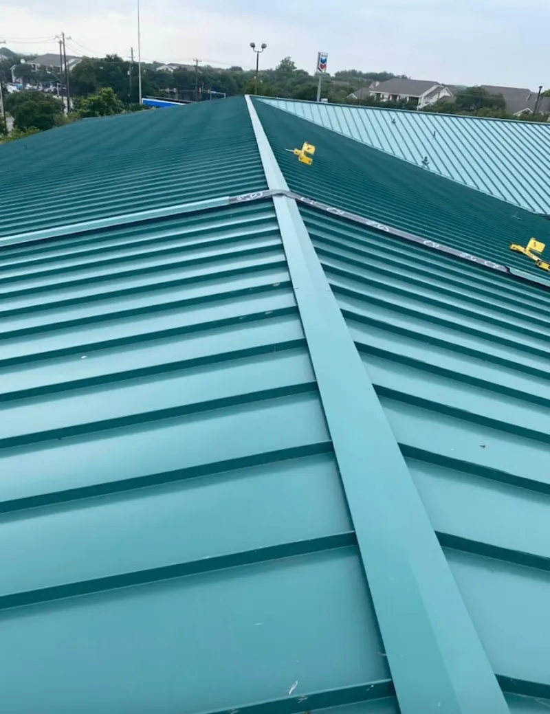Green commercial metal roof ridge and valley for Metal Roof Repair in Suffern